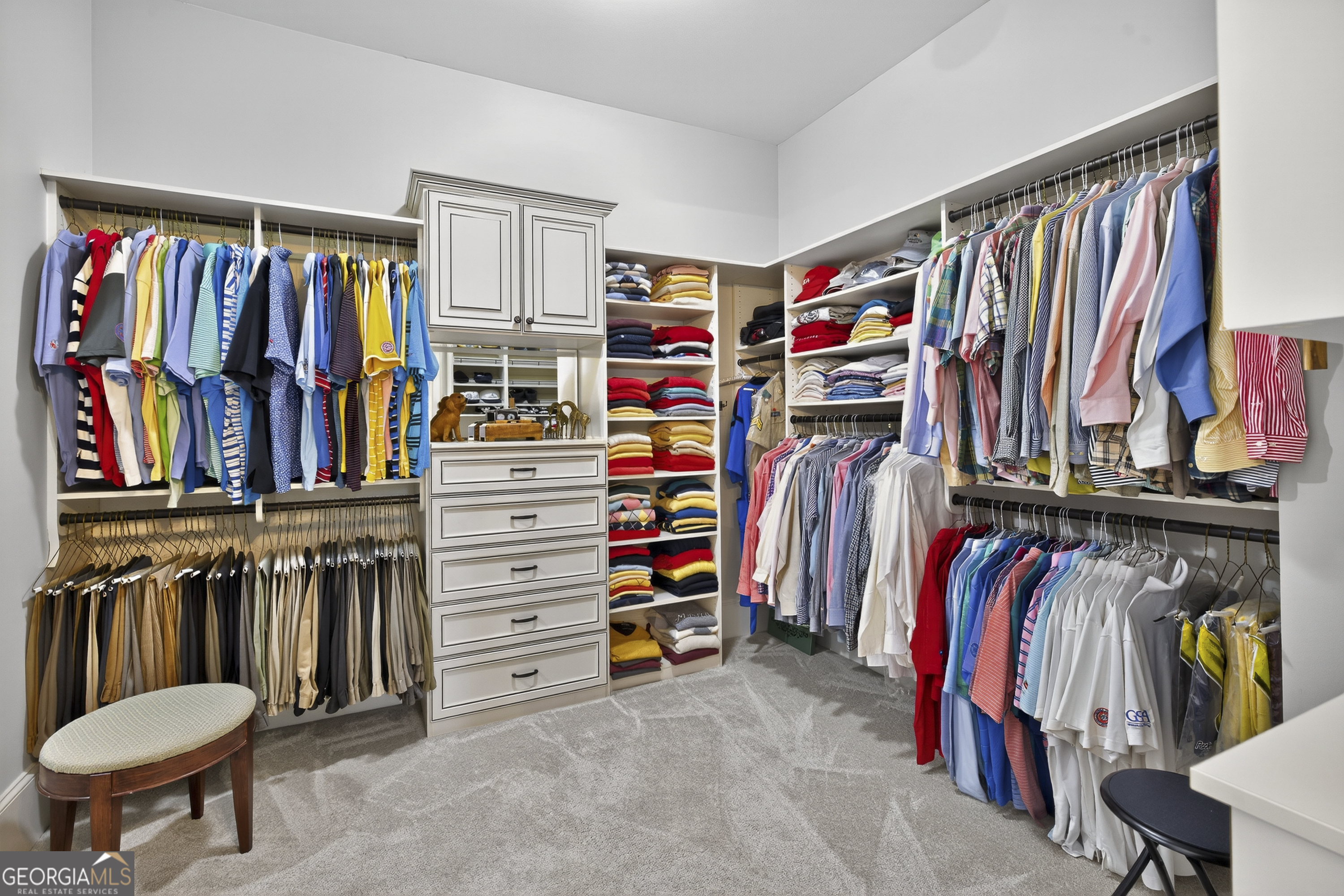 675 Garden Circle Statham, GA 30666 - Photo 39 of 98 a view of walk in closet with clothes and shoes