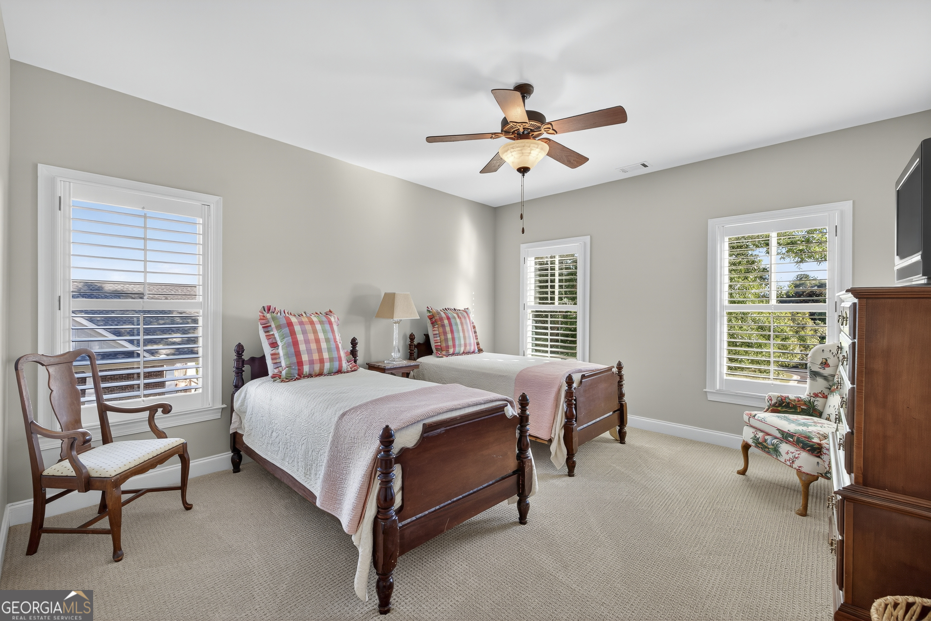 675 Garden Circle Statham, GA 30666 - Photo 50 of 98 a bedroom with a bed chair and a window