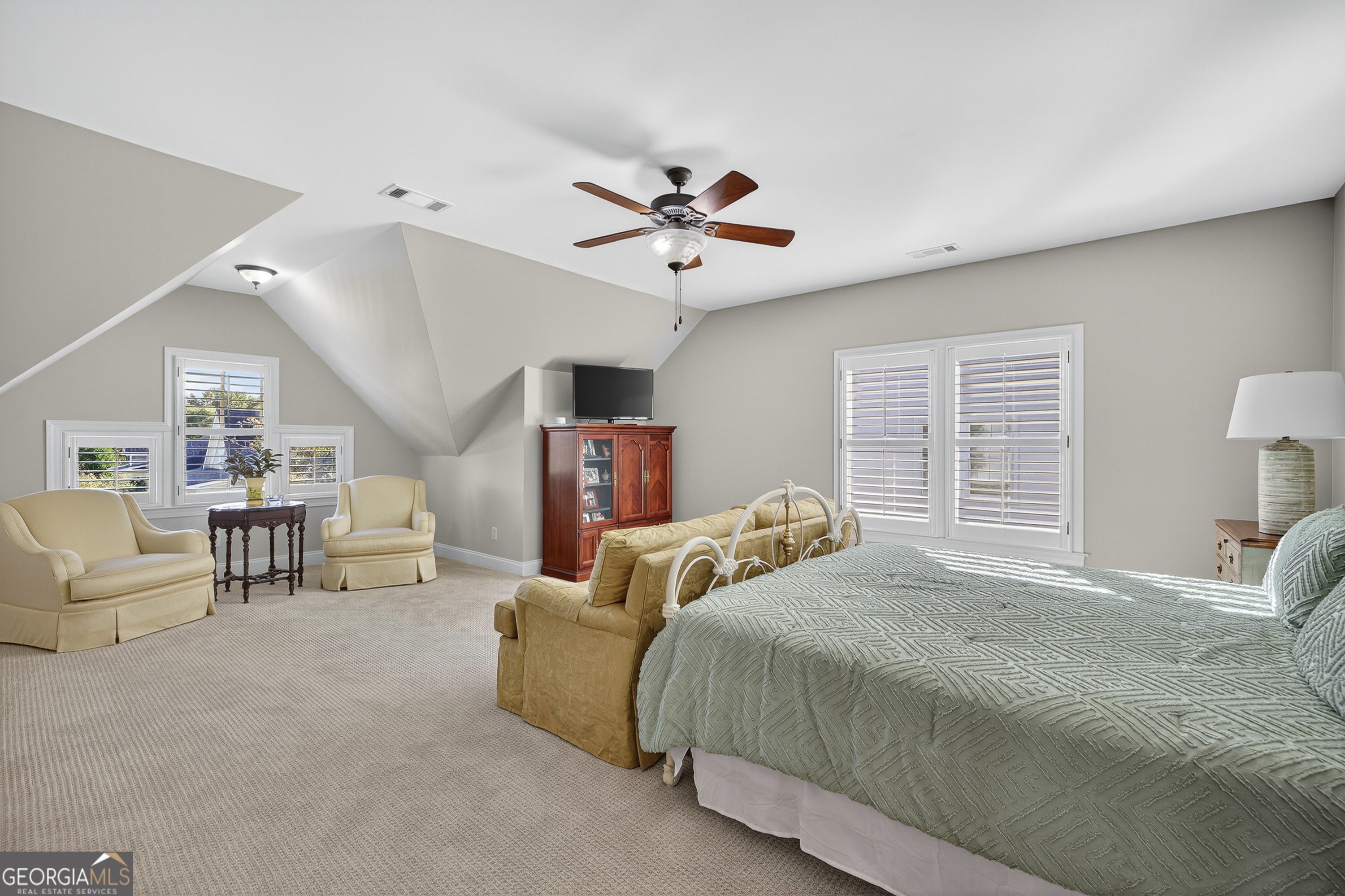 675 Garden Circle Statham, GA 30666 - Photo 57 of 98 a bedroom with furniture and a large window