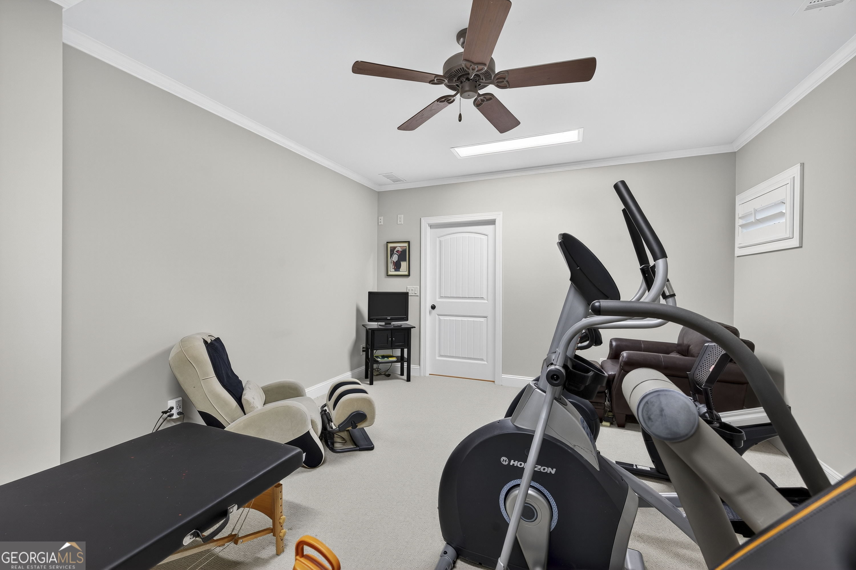 675 Garden Circle Statham, GA 30666 - Photo 66 of 98 a view of a workspace with furniture and a window