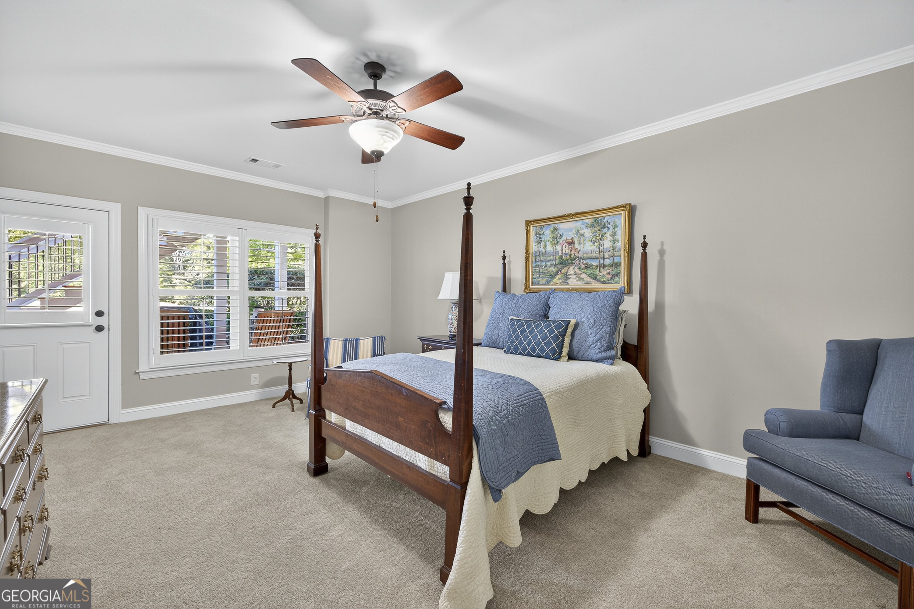 675 Garden Circle Statham, GA 30666 - Photo 71 of 98 a bed room with a bed and a couch