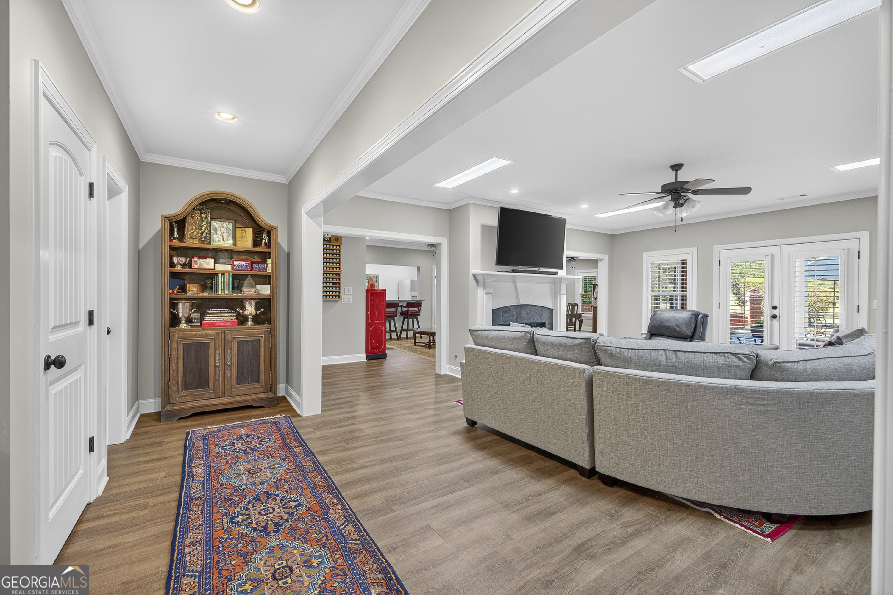 675 Garden Circle Statham, GA 30666 - Photo 73 of 98 a living room with furniture and a flat screen tv