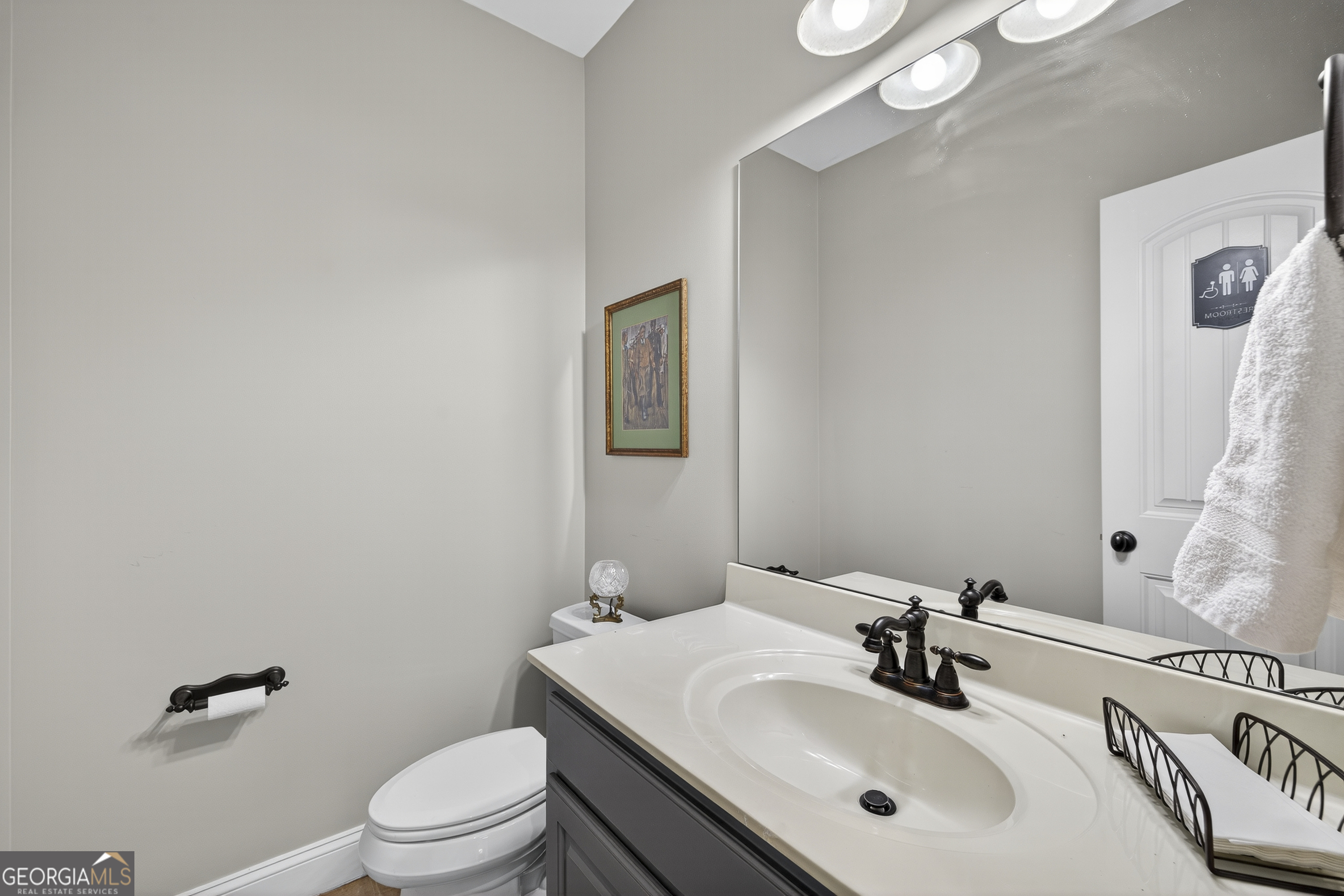 675 Garden Circle Statham, GA 30666 - Photo 74 of 98 a bathroom with a sink toilet and mirror