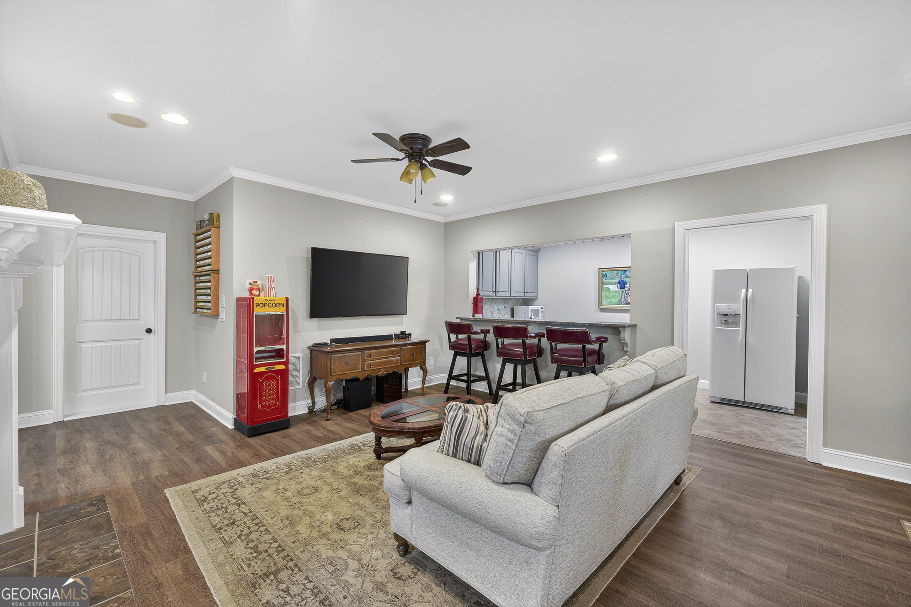 675 Garden Circle Statham, GA 30666 - Photo 79 of 98 a living room with furniture and a flat screen tv