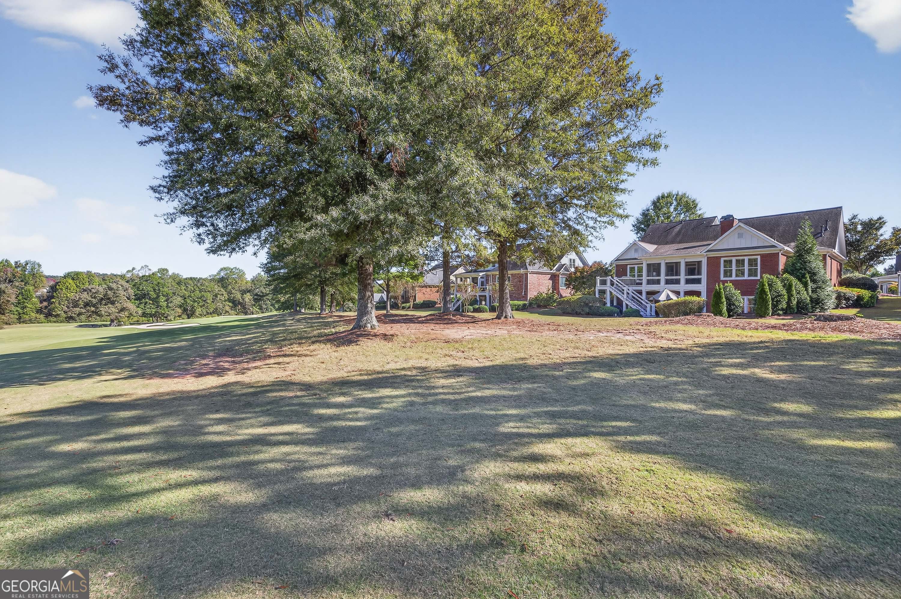 675 Garden Circle Statham, GA 30666 - Photo 8 of 98 a view of street with houses and trees in the background