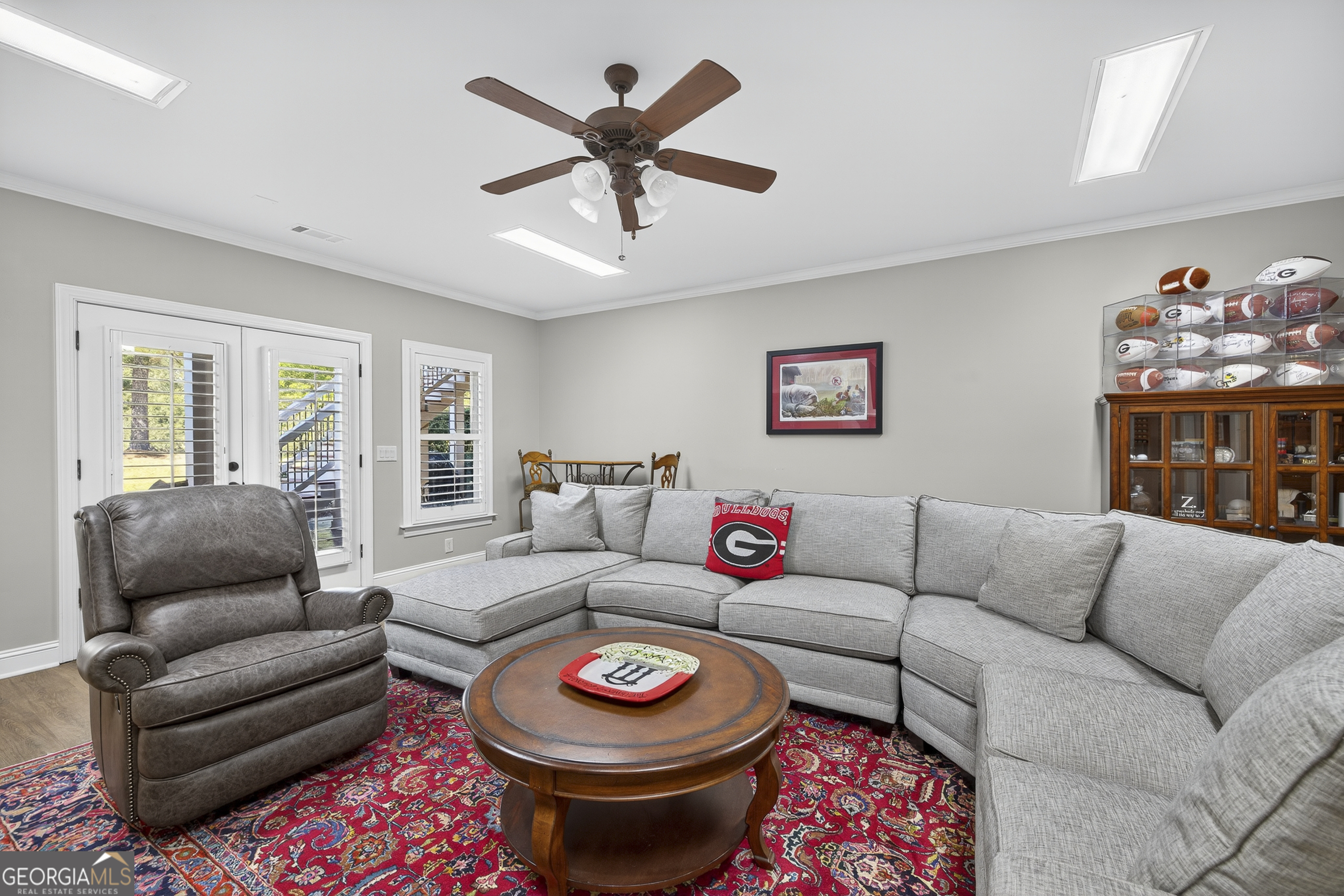 675 Garden Circle Statham, GA 30666 - Photo 90 of 98 a living room with furniture and a wooden floor