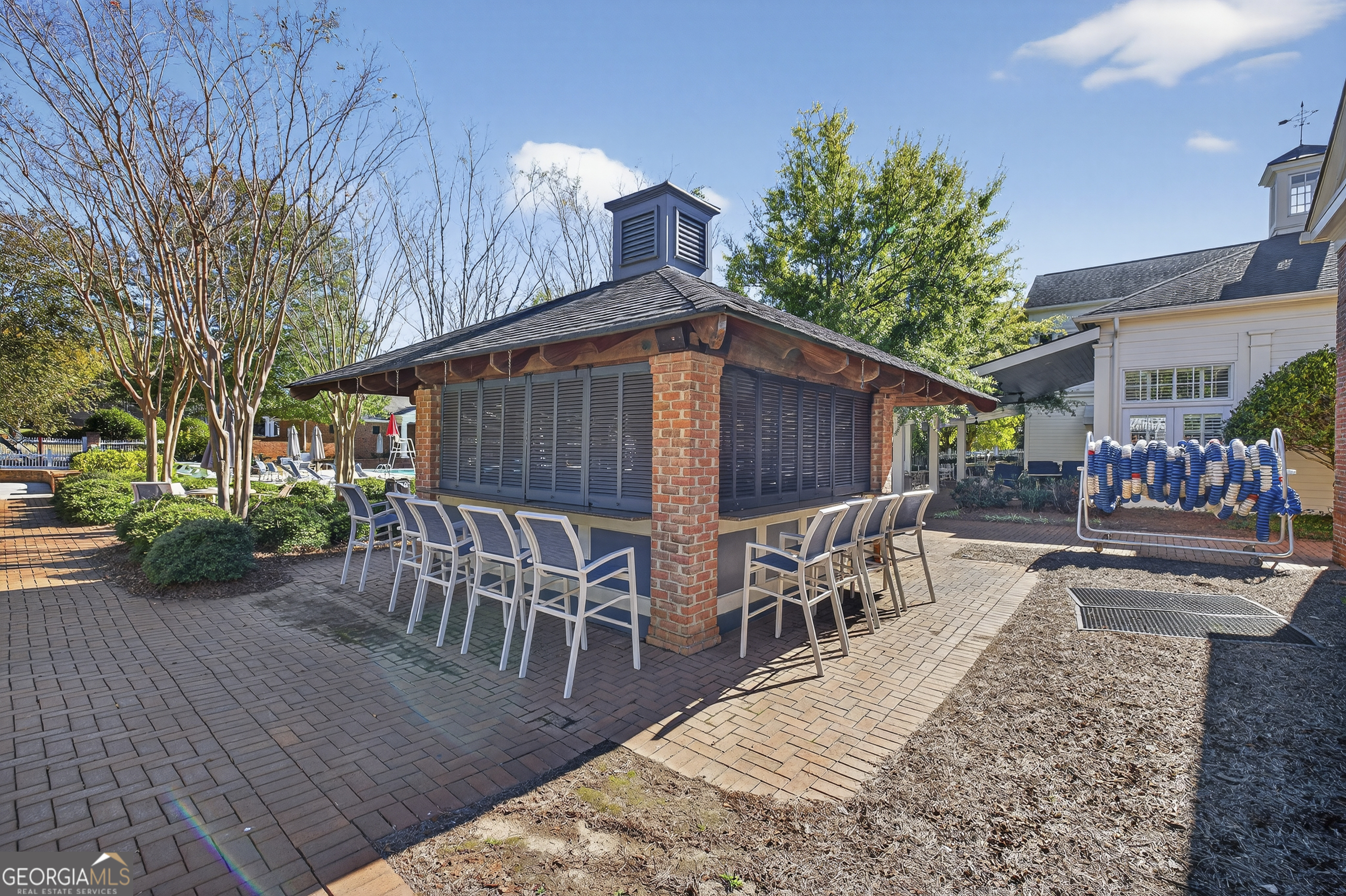 675 Garden Circle Statham, GA 30666 - Photo 95 of 98 a view of a patio with table and chairs with wooden floor and fence