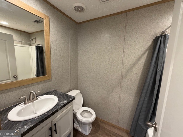 907 Orianna Road East Dublin, GA 31027 - Photo 15 of 21 a bathroom with a granite countertop sink toilet and a mirror