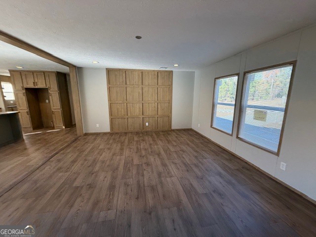 907 Orianna Road East Dublin, GA 31027 - Photo 19 of 21 an empty room with wooden floor and windows