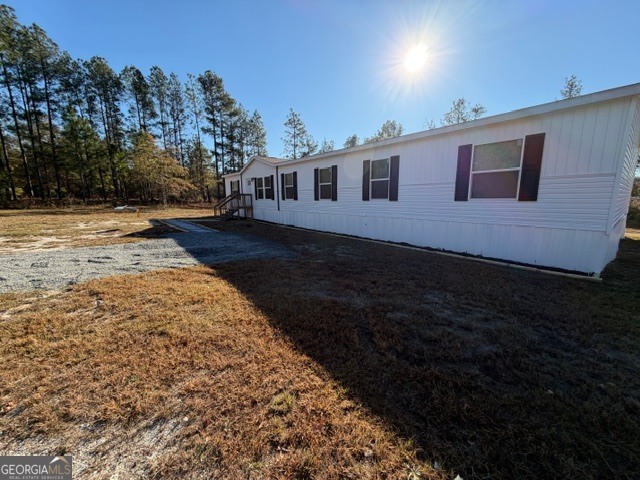907 Orianna Road East Dublin, GA 31027 - Photo 2 of 21 a front view of a house with a yard
