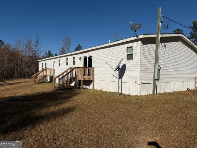 907 Orianna Road East Dublin, GA 31027 - Photo 5 of 21 a front view of a house with street