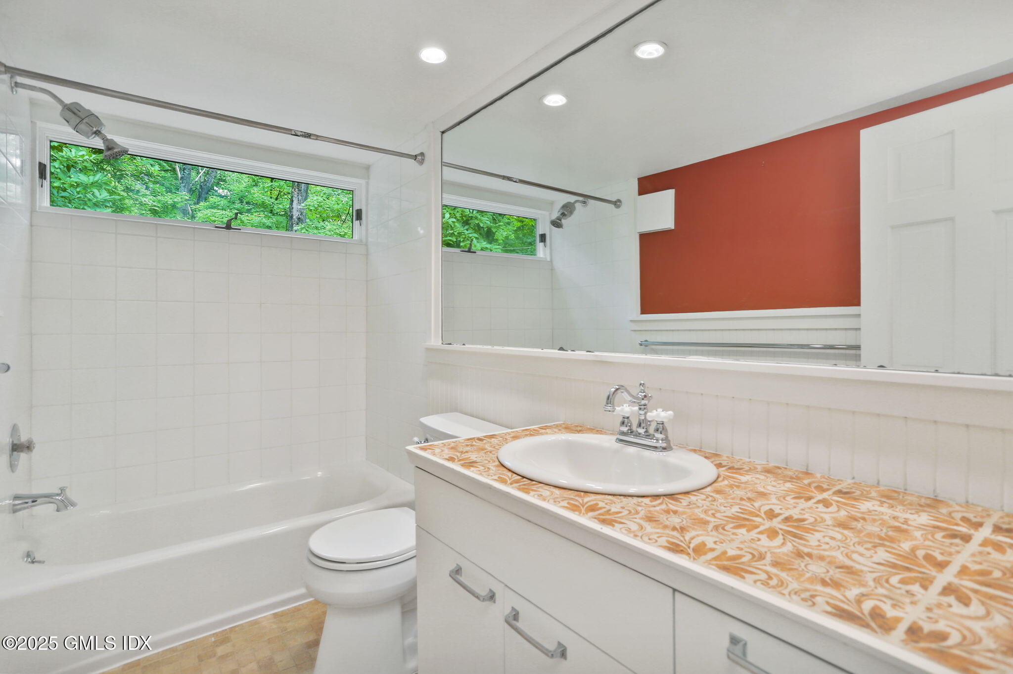 27 Seeley Road Wilton, CT 06897 - Photo 16 of 27 a bathroom with a sink a toilet and shower