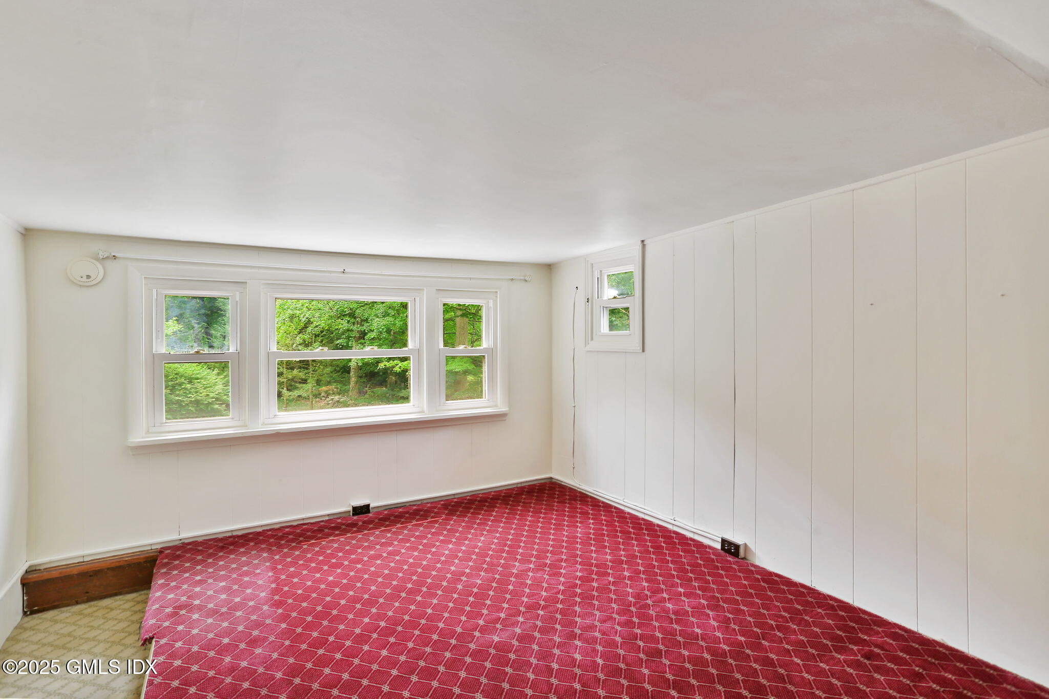 27 Seeley Road Wilton, CT 06897 - Photo 17 of 27 a view of an empty room with a window