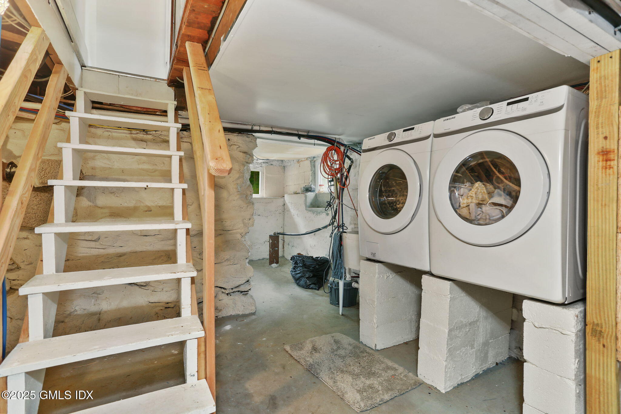27 Seeley Road Wilton, CT 06897 - Photo 21 of 27 a utility room with dryer and washer