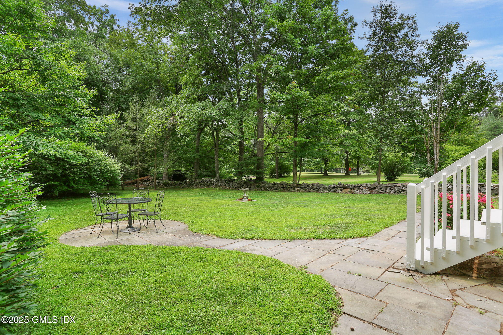 27 Seeley Road Wilton, CT 06897 - Photo 24 of 27 a view of a bench in a park