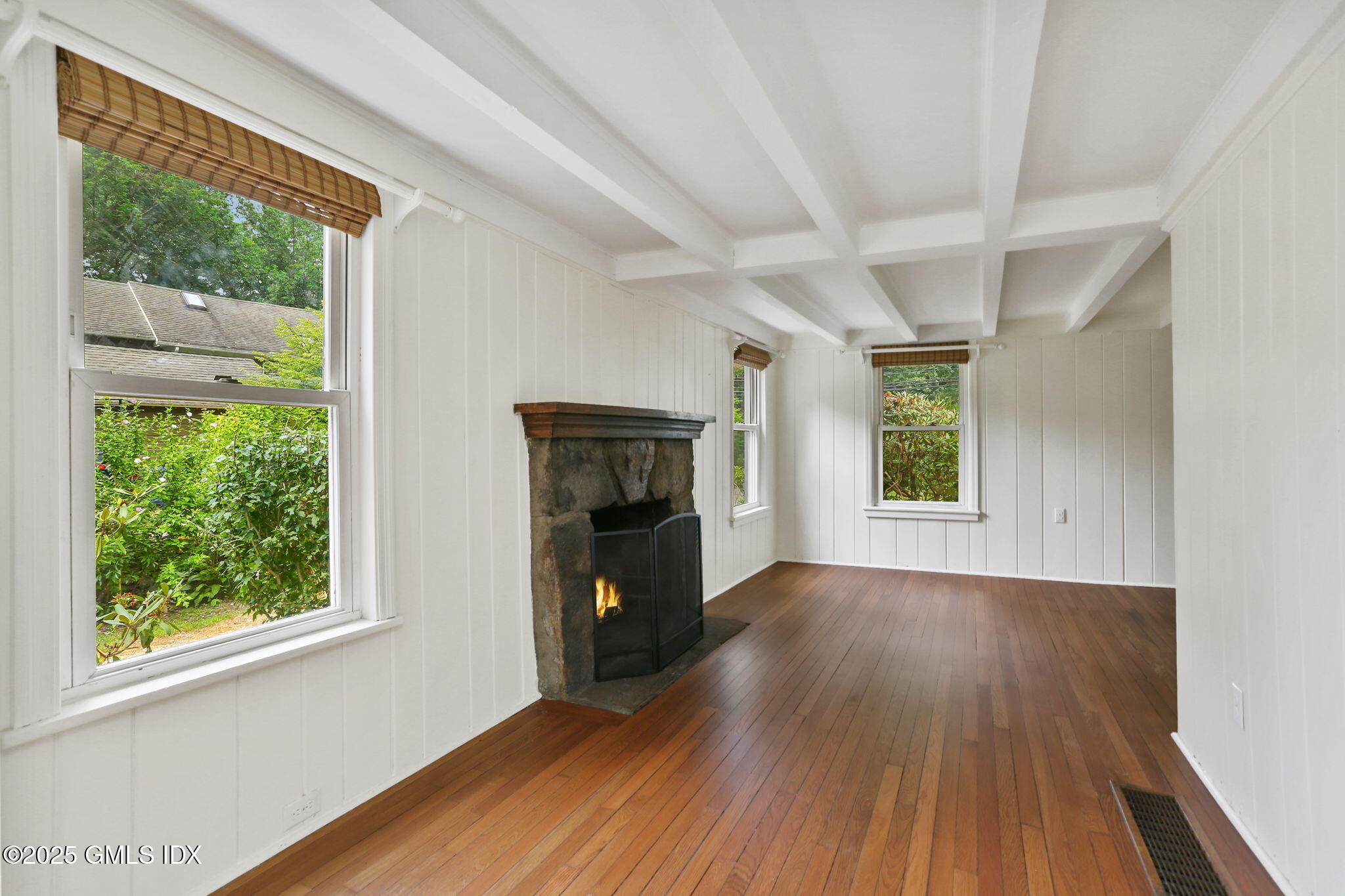 27 Seeley Road Wilton, CT 06897 - Photo 4 of 27 wooden floor in an empty room with a window
