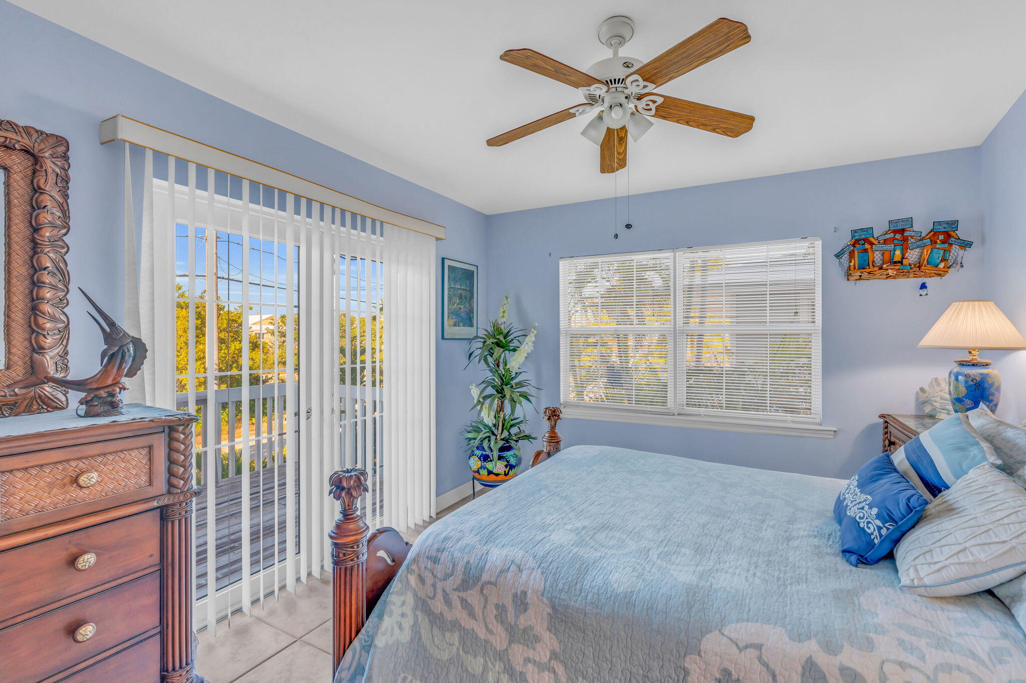 28560 Doubloon Road Summerland Key, FL 33042 - Photo 26 of 52 a bed room with a bed and a window