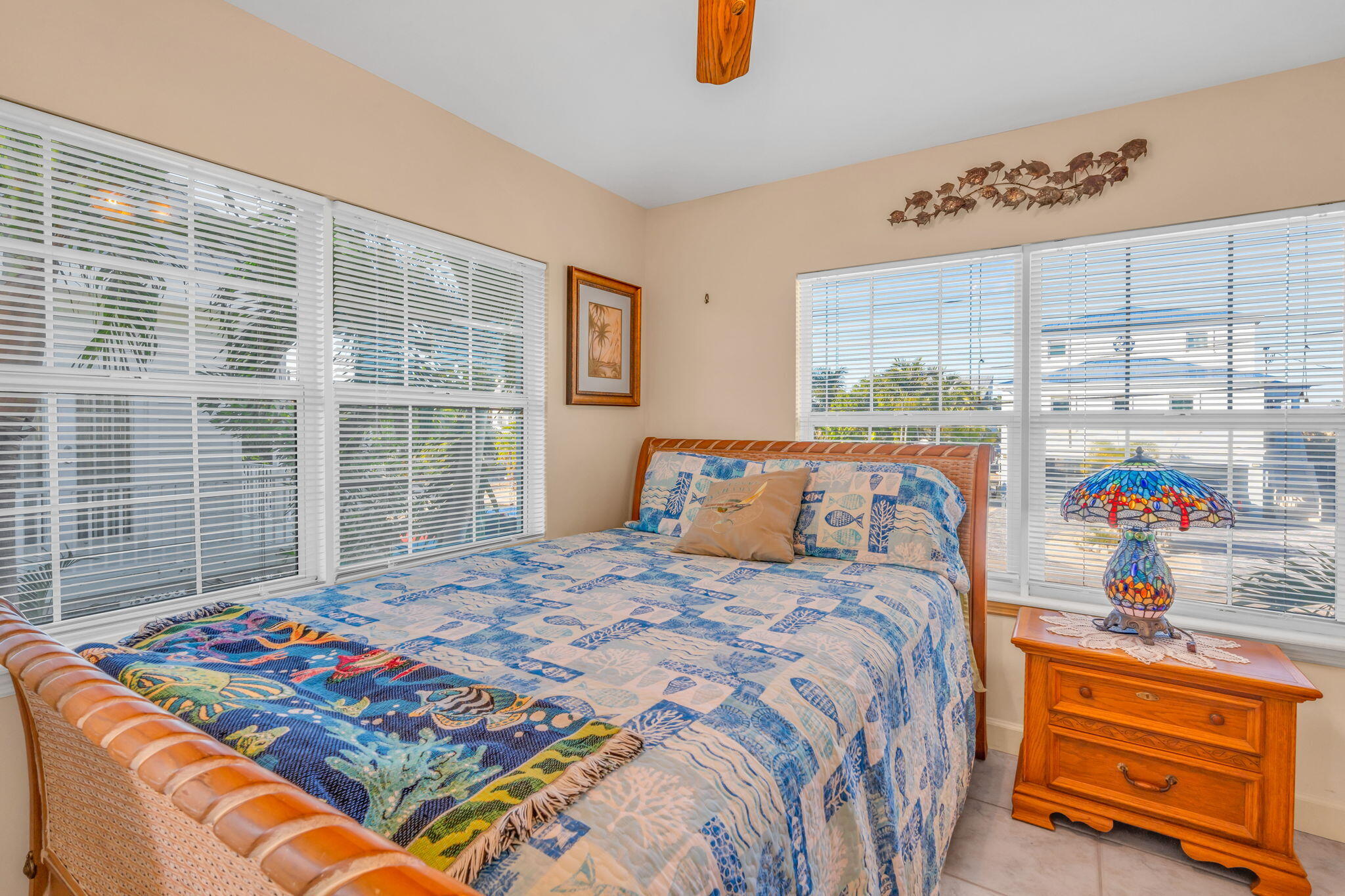 28560 Doubloon Road Summerland Key, FL 33042 - Photo 27 of 52 a bedroom with a bed and a window
