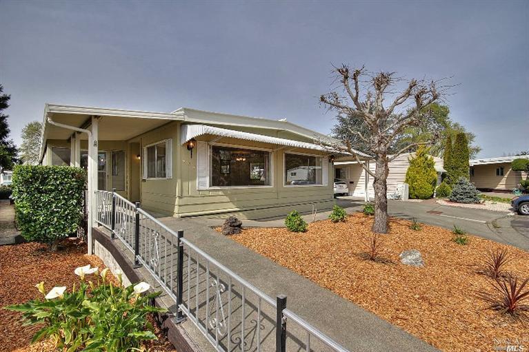 New exterior paint and landscaping invite you to 204 Regency Court.