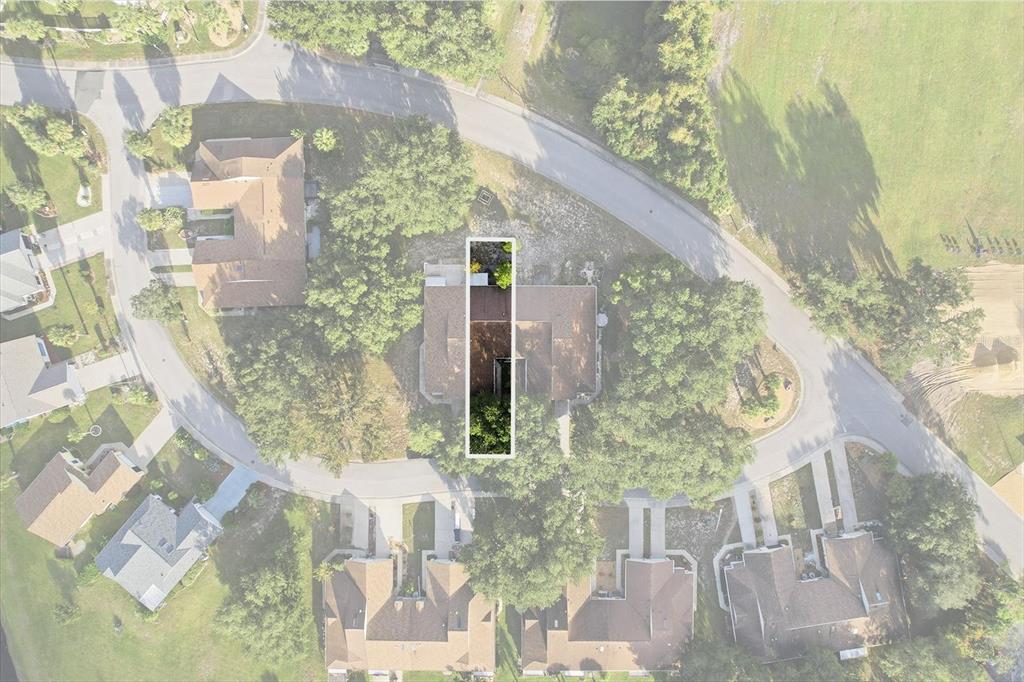 a vase of flowers sitting on a table next to a window