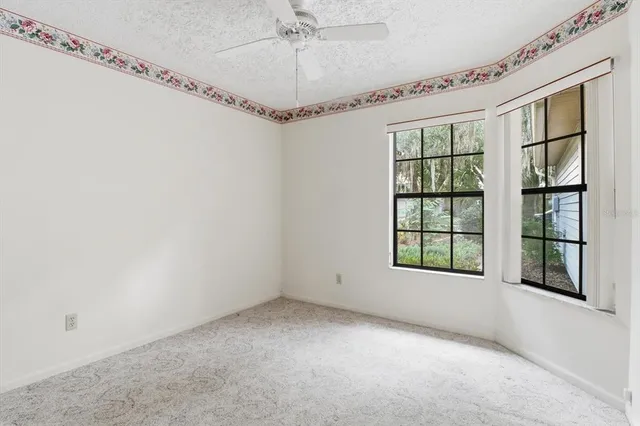 a view of a hallway with a chandelier