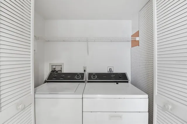 a view of a room with racks on the wall