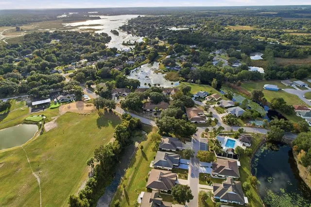 a sign broad in front of a road