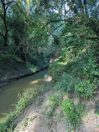 a view of a field with an outdoor space