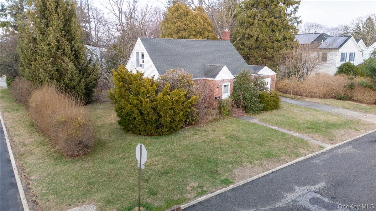 74 Floral Avenue Bethpage, NY 11714 - Photo 6 of 6 a view of a yard in front of the house