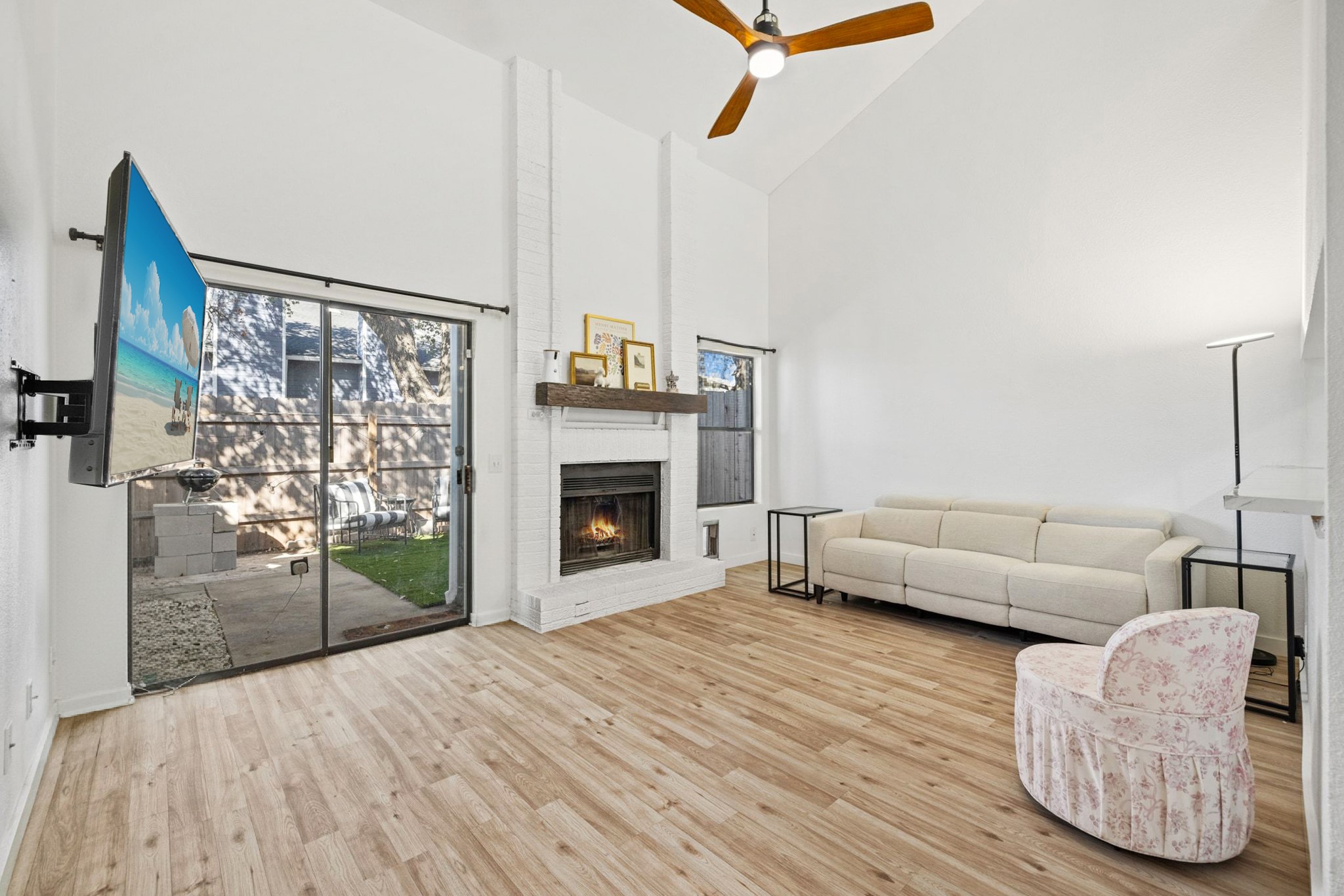 1010 West Rundberg Lane, Unit 30 Austin, TX 78758 - Photo 2 of 30 a living room with furniture and a fireplace