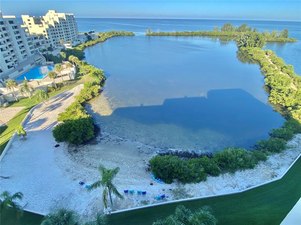 a view of a lake with a yard