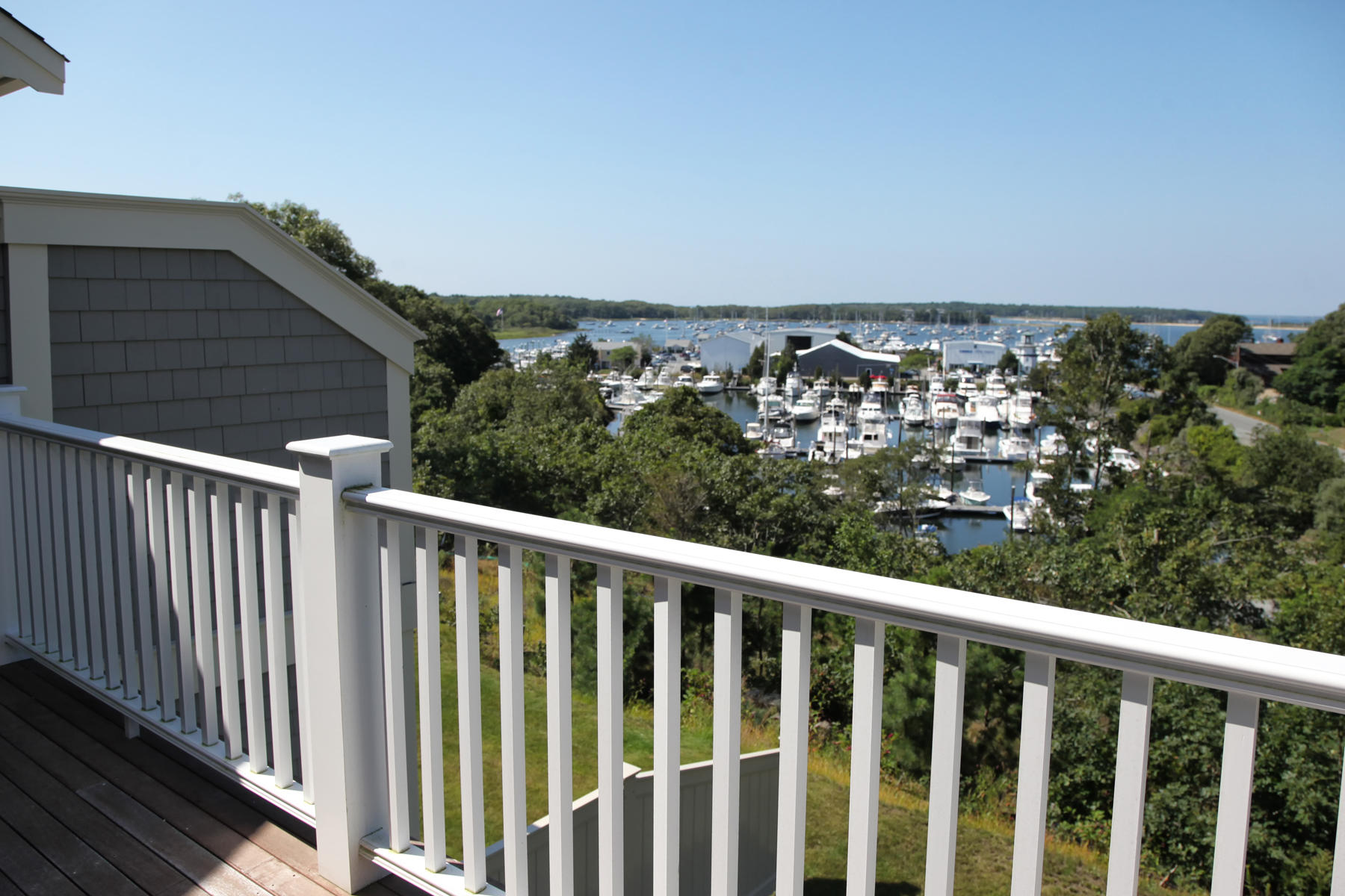 1090 Shore Road, Unit 5 Pocasset, MA 02559 - Photo 1 of 32 a view of a balcony with city view