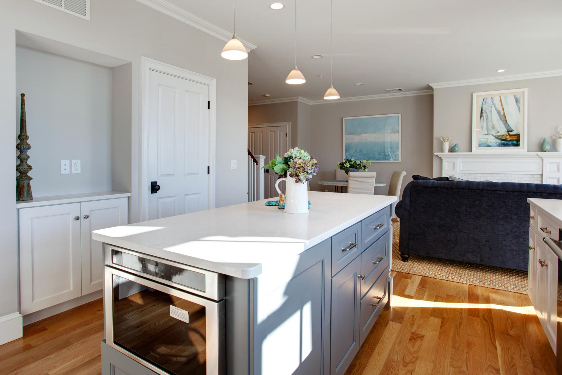1090 Shore Road, Unit 5 Pocasset, MA 02559 - Photo 11 of 32 a spacious kitchen with stainless steel appliances granite countertop a sink and a stove