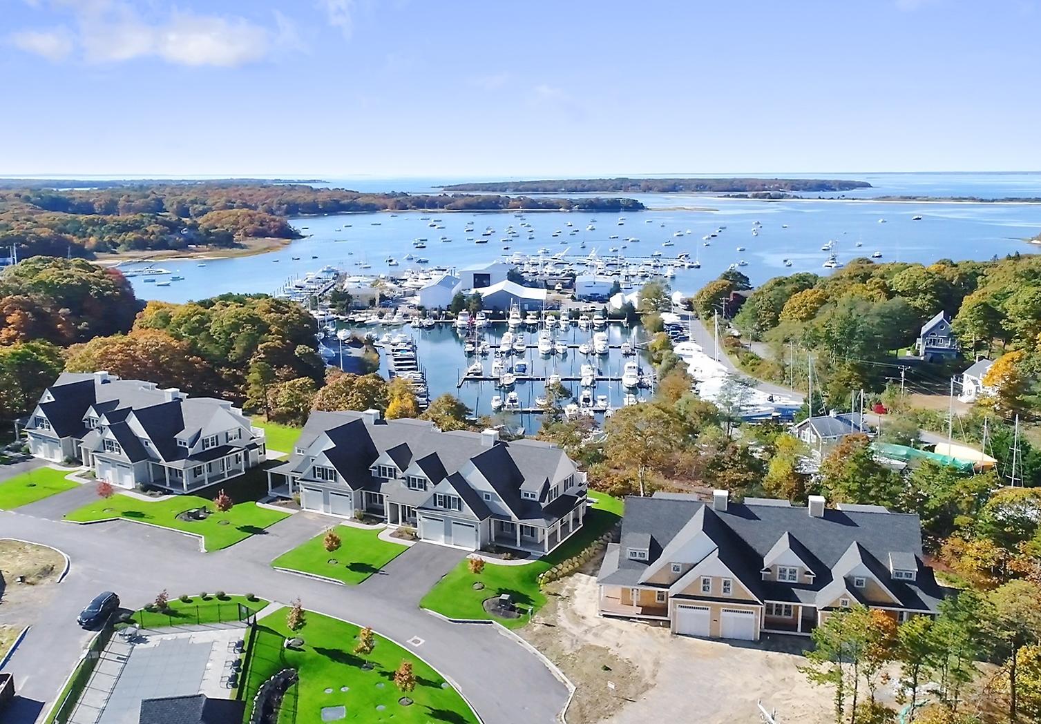 1090 Shore Road, Unit 5 Pocasset, MA 02559 - Photo 2 of 32 an aerial view of multiple house