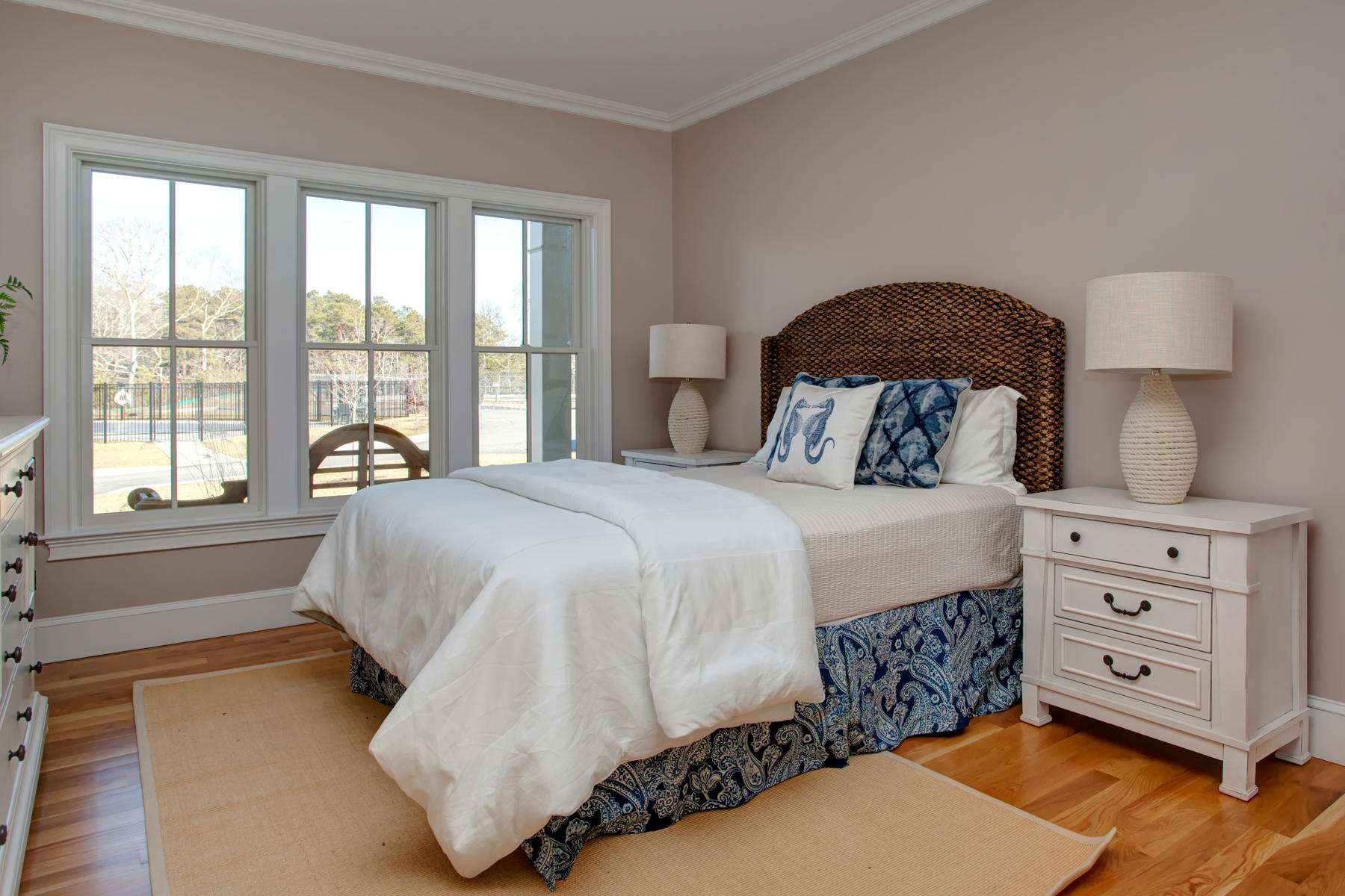 1090 Shore Road, Unit 5 Pocasset, MA 02559 - Photo 4 of 32 a bedroom with a bed and a window