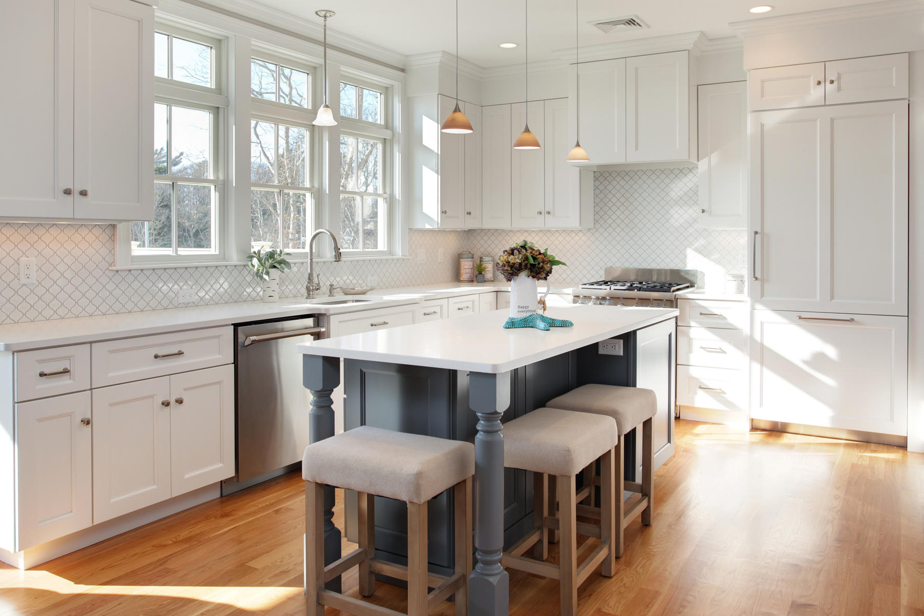 1090 Shore Road, Unit 5 Pocasset, MA 02559 - Photo 8 of 32 a kitchen with a dining table chairs and white appliances