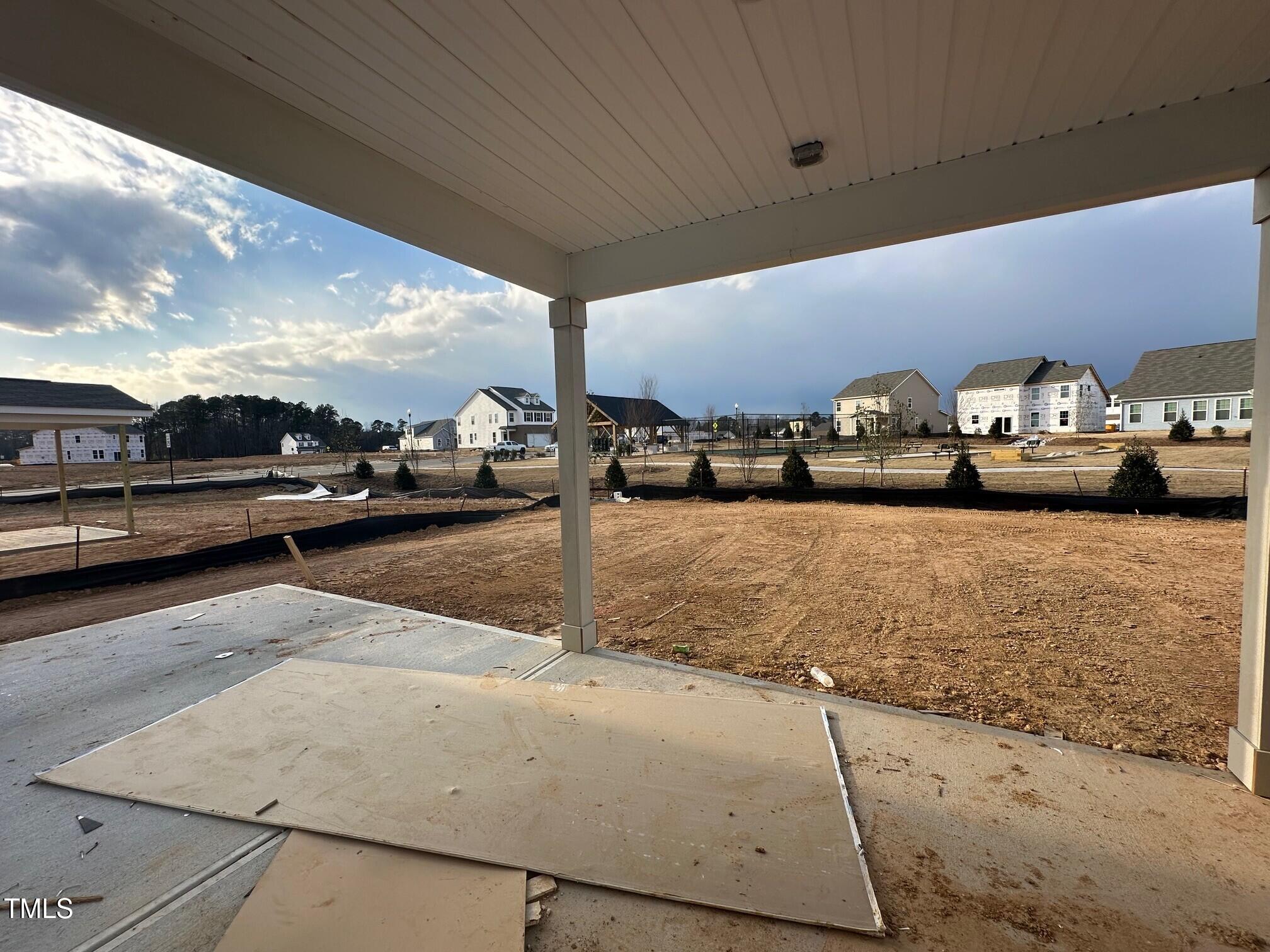 1105 Channel Drop Loop Zebulon, NC 27597 - Photo 5 of 26 covered back porch