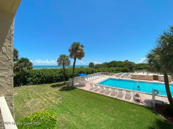 a view of an outdoor space and swimming pool