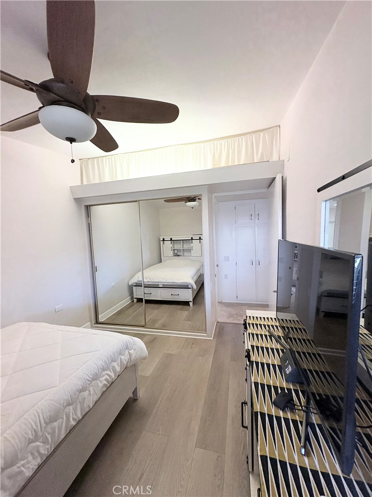 1680 Monterey Road Seal Beach, CA 90740 - Photo 19 of 19 a bedroom with furniture and a potted plant