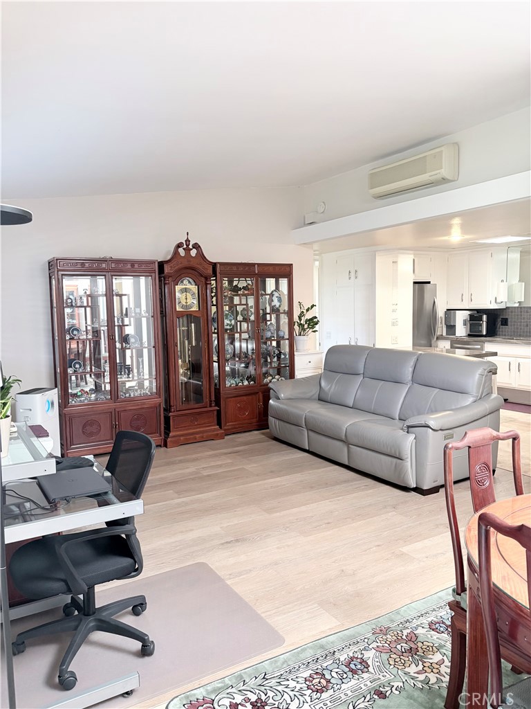 1680 Monterey Road Seal Beach, CA 90740 - Photo 7 of 19 a living room with furniture a rug and a window