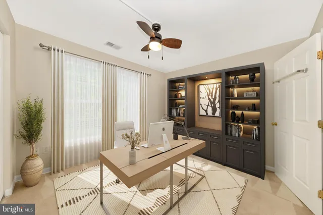 a living room with furniture and window