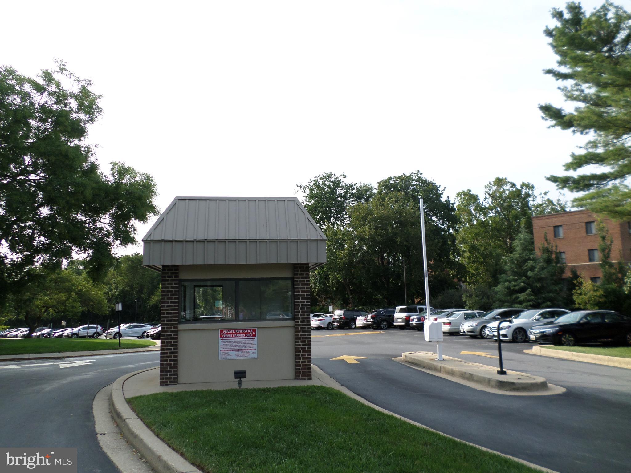 9900 Georgia Avenue, Unit 27707 Silver Spring, MD 20902 - Photo 26 of 29 Gatehouse, entrance to condo complex & parking