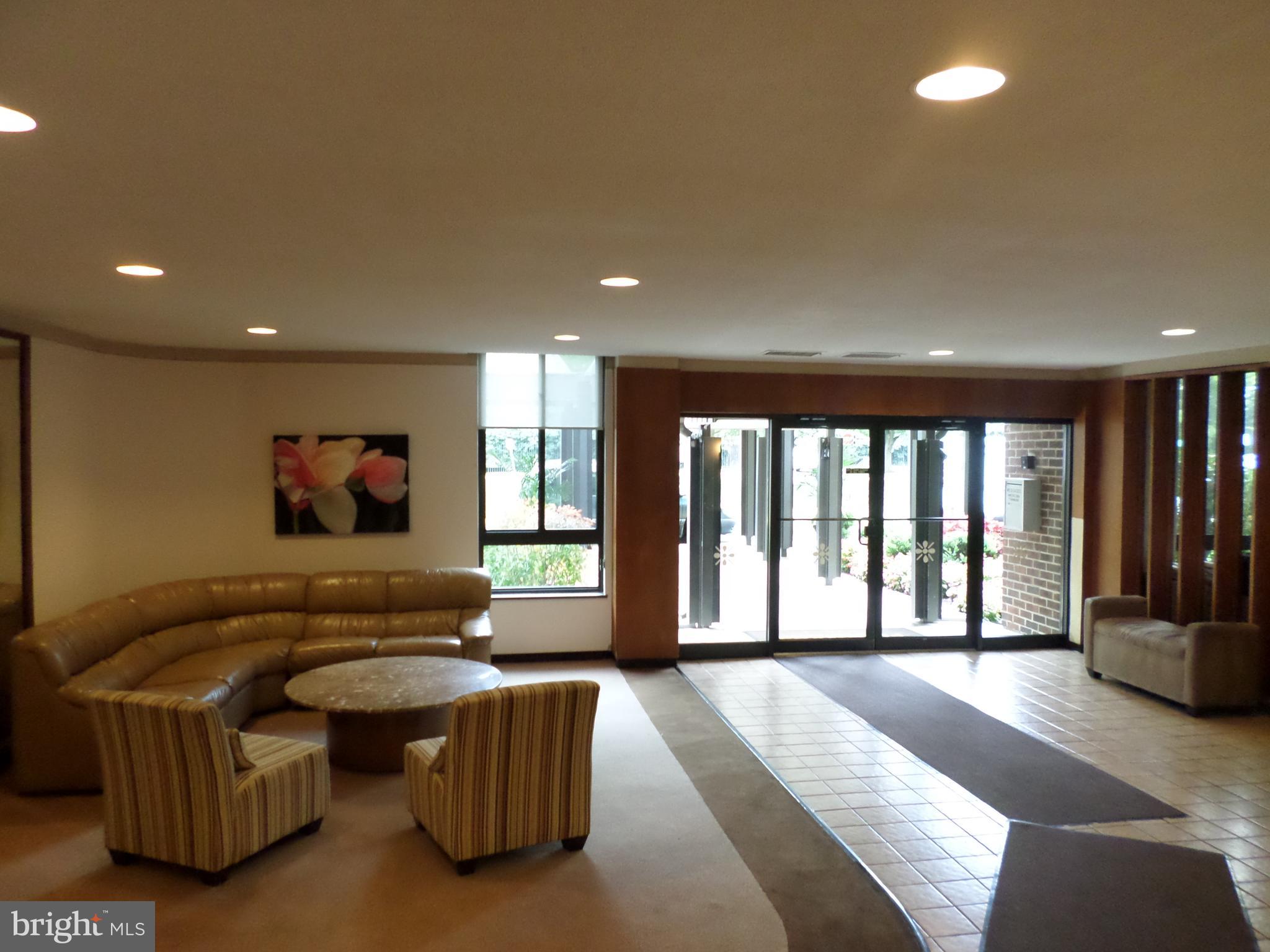 9900 Georgia Avenue, Unit 27707 Silver Spring, MD 20902 - Photo 3 of 29 Entrance to lobby