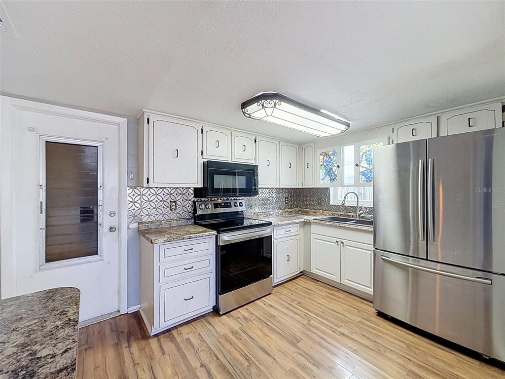 9151 Barrington Lane Port Richey, FL 34668 - Photo 7 of 23