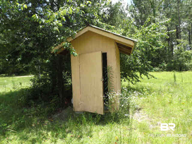 373 Heaton Circle Brewton, AL 36426 - Photo 14 of 16 Water Pump Shed