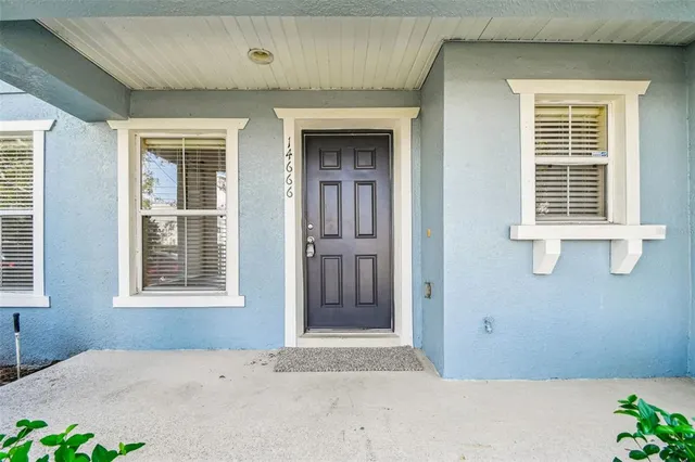 a view of a house with garden
