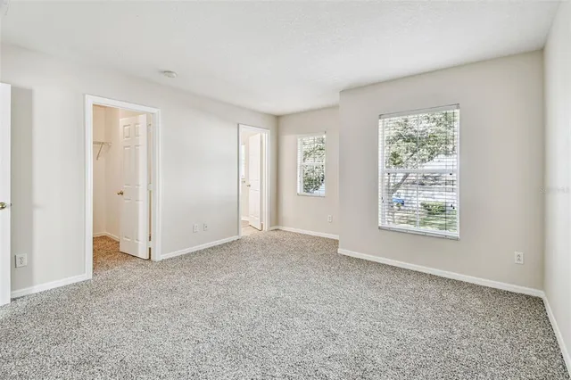 an empty room with windows