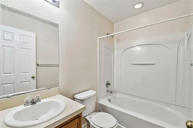 a front view of a house with a garage