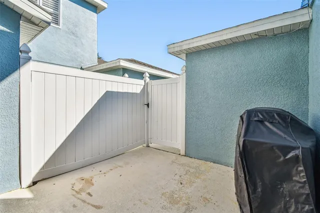 a aerial view of a house with table and chairs