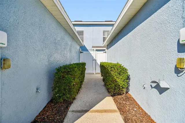 front view of brick house with a yard